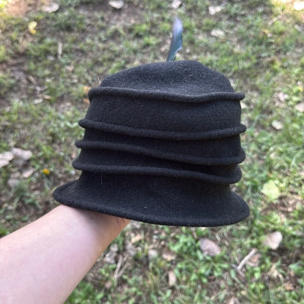 Scala Black Cloche Hat with Feather and Floral Detail handmade wool